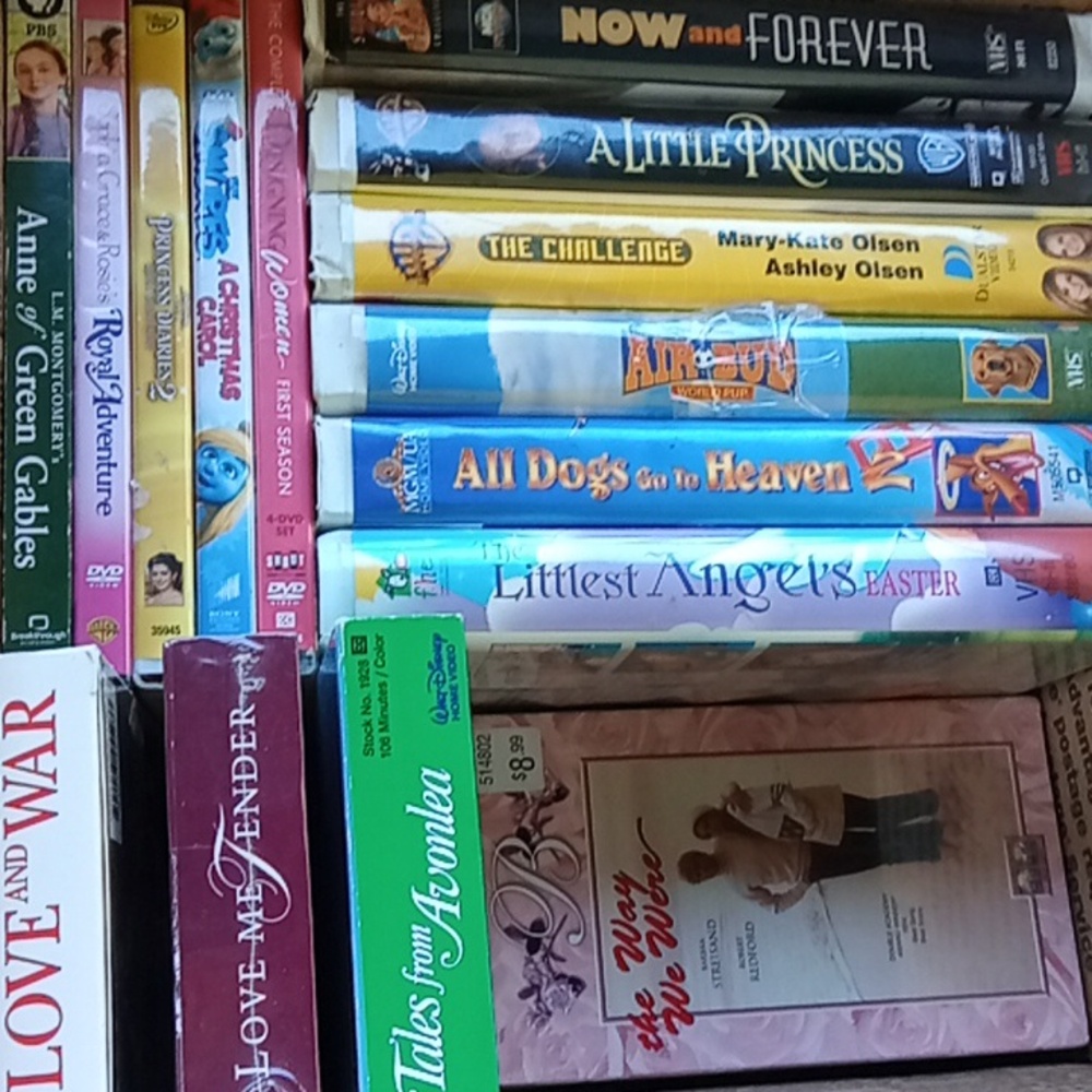 VHS Tapes And DVDs Bundle